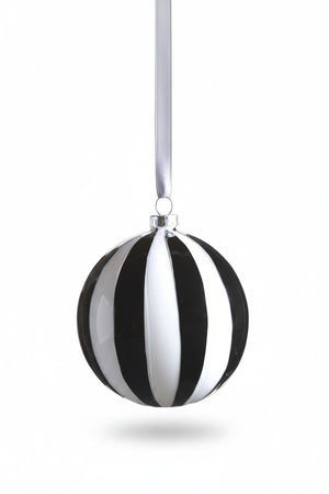 ZODAX TWILIGHT STRIPE GLASS ORNAMENT: a 4-inch diameter glass ornament featuring alternating black and white vertical stripes, hanging from a grey ribbon.