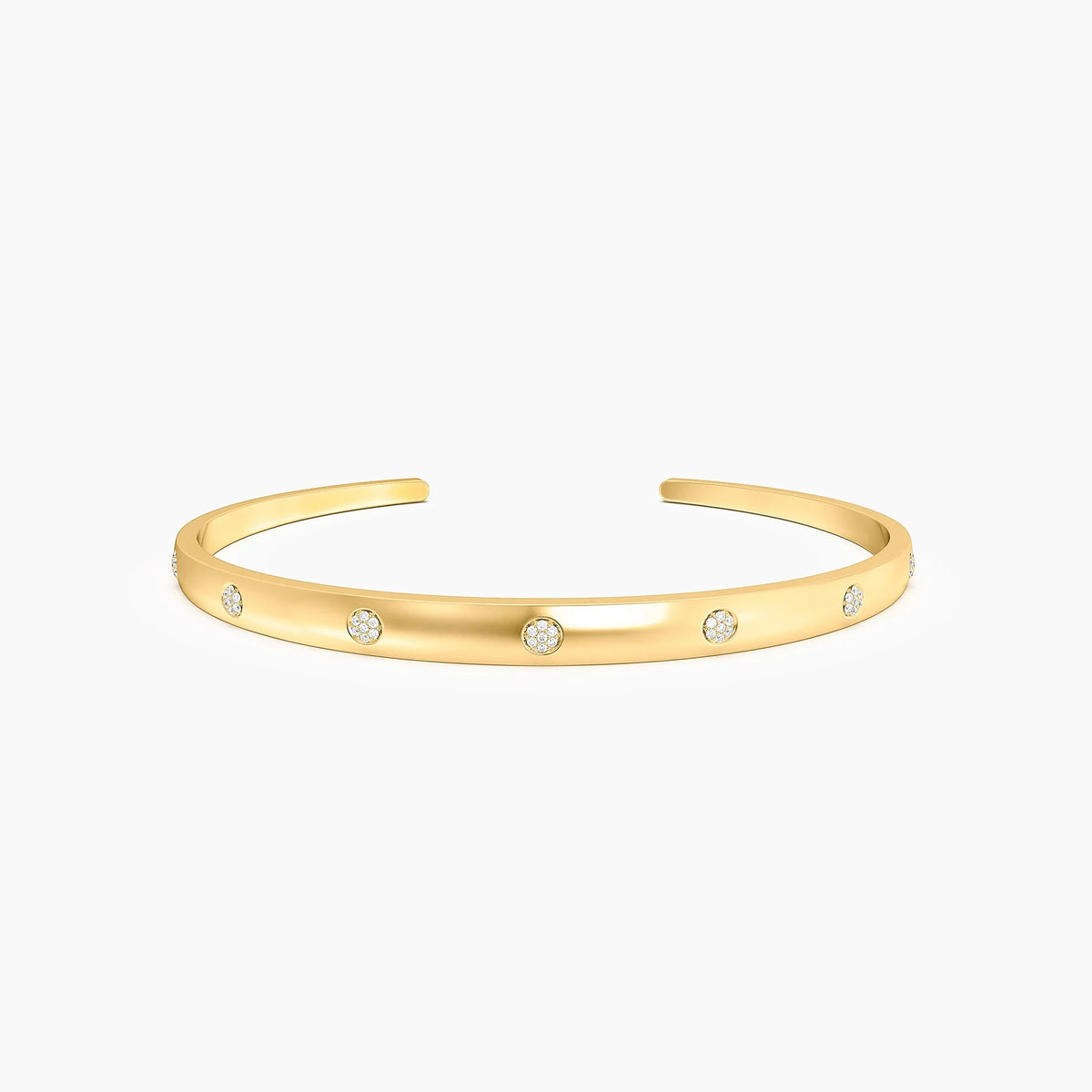 The ELLA STEIN Lucky 7 Cuff Bracelet by ELLA STEIN is a delicate, open gold-plated bracelet featuring evenly spaced small round diamonds, shown against a plain white background.