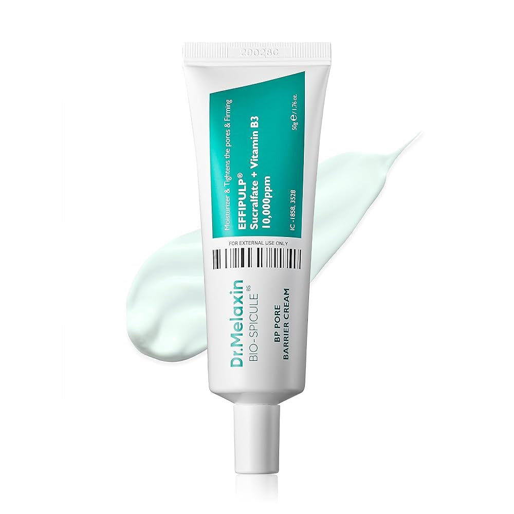 A tube of DR MELAXIN - BP PORE BARRIER CREAM by KOSMIC KBEAUTY SKINCARE stands upright on a white surface with a light green smear behind it—ideal for pore care and strengthening your skin barrier.