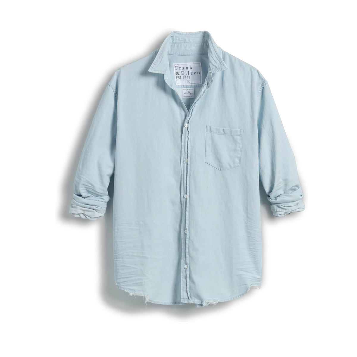 The FRANK &amp; EILEEN LUKE Men's Button Up Shirt in Famous Denim Classic Denim Tattered Wash is shown from the back, with long sleeves, buttoned cuffs, a curved hem, and an oversized relaxed fit for a casual look.