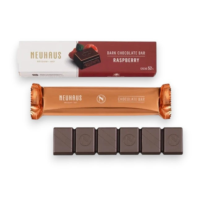 The NEUHAUS – DARK CHOCOLATE RASPBERRY BAR by NEUHAUS, crafted in Belgium, is pictured in its packaging—both sealed and unwrapped—with six rectangular pieces filled with rich raspberry ganache showcased below the wrappers.