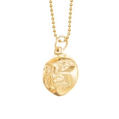 The JUJU - ACCEPTANCE DOUBLE FACED MOON MAN CHARM, crafted by Juju Supply Co., is a gold necklace featuring a spherical pendant with an intricate, raised design of a rabbit and a mystical moon charm. The pendant hangs elegantly from a beaded chain, showcased against a white background.