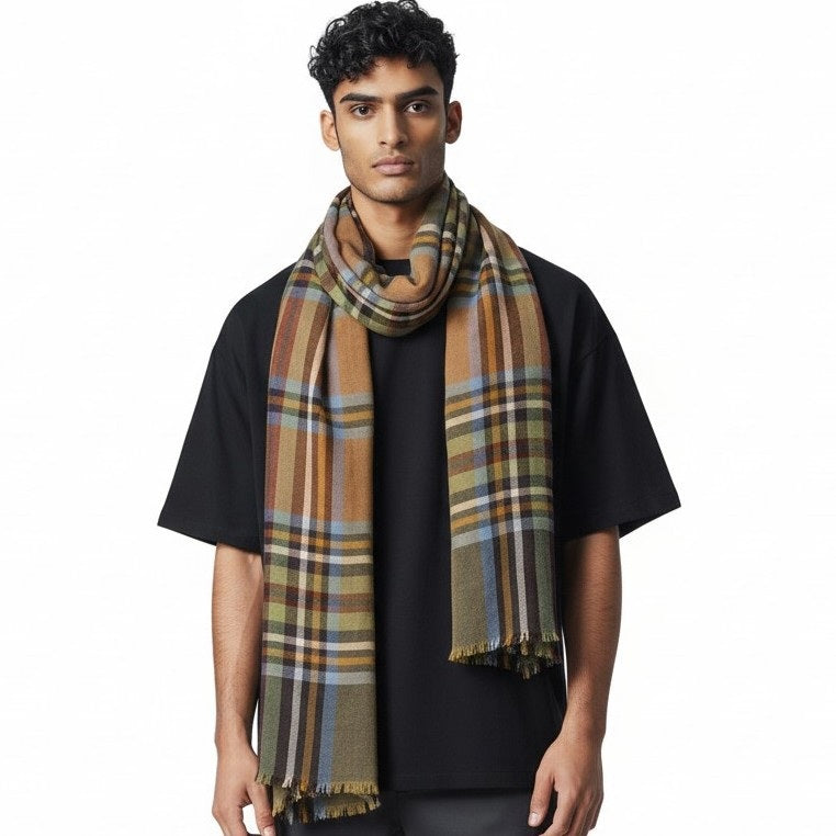 A tartan wool scarf from HARTFORD, showcasing a classic plaid pattern in camel, blue, and burgundy, is laid flat on a white background—this HARTFORD Tartan Wool Scarf is the perfect men’s winter accessory.