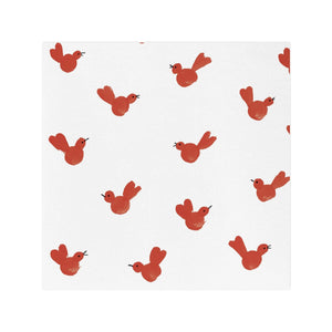 RED BIRD COCKTAIL NAPKIN: white cocktail napkins featuring a repeating pattern of small, hand-painted style red birds.