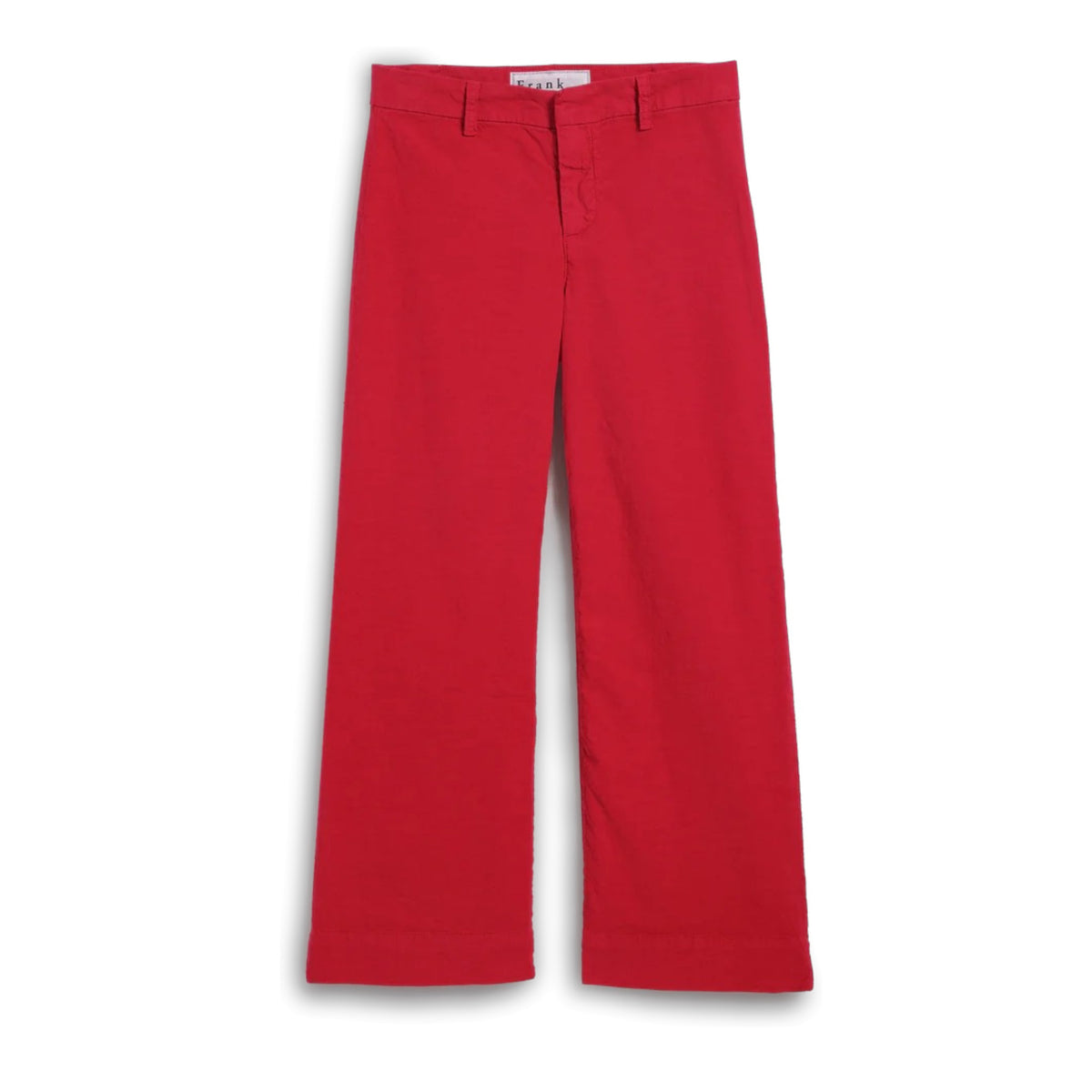 A person stands outdoors on a wooden deck, wearing FRANK &amp; EILEEN’s Wexford Wide Leg Linen Pant in Double Decker Red, a white printed shirt with rolled sleeves, and light-colored slide sandals. The person's face is not visible.