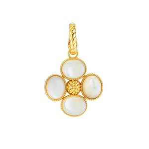 The CAPUCINE DE WULF - BERRY CLOVER DOUBLE SIDED PENDANT features a gold clover design with a textured, dotted surface and mother of pearl center. It includes a twisted loop for chain attachment.