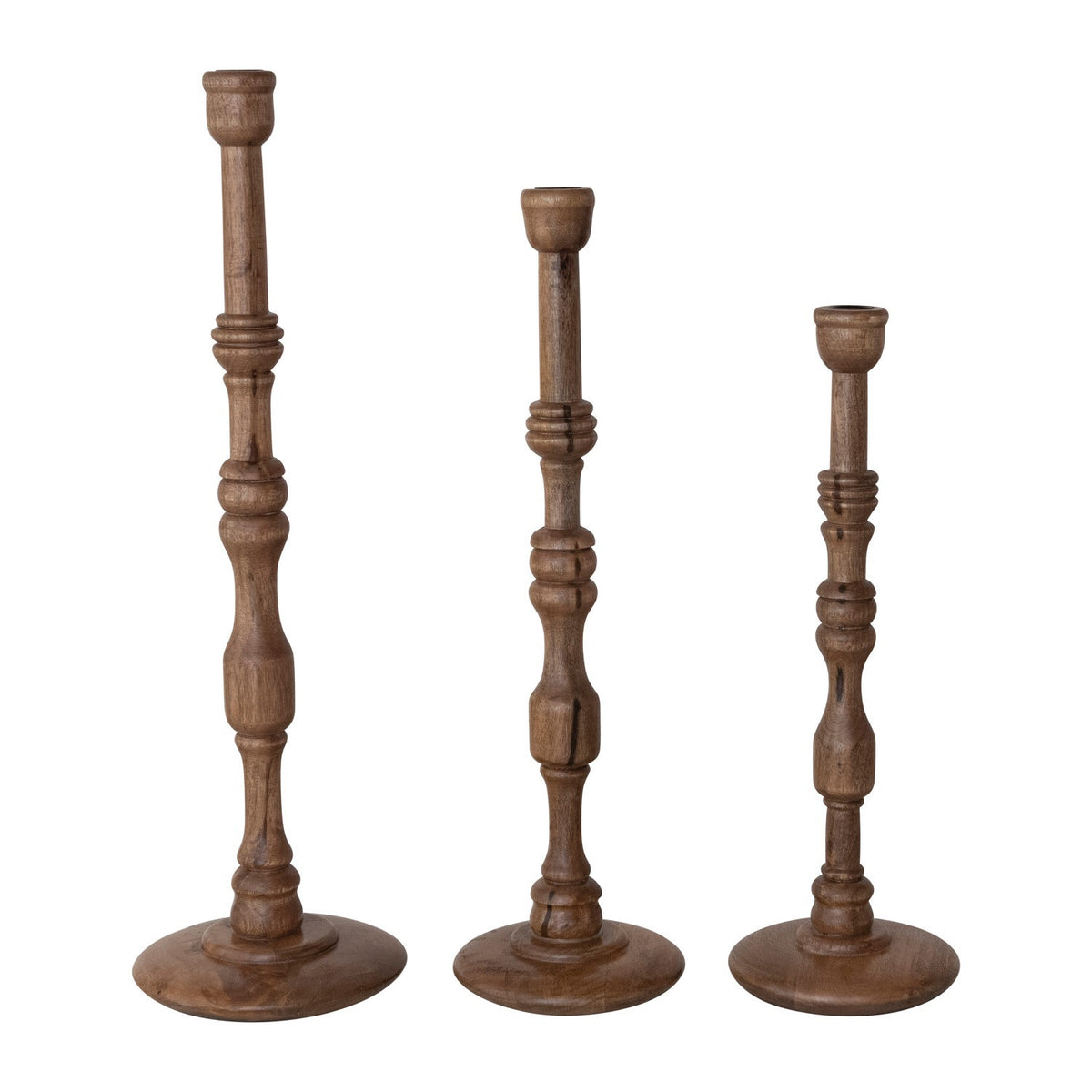 The CREATIVE COOP TURNED MANGO WOOD TAPER HOLDER, SMALL, features a traditional baluster-style stem and round base in mango wood, showcased on a white background.
