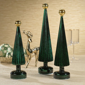 The ZODAX LED TREE WITH GLOBE FINIAL features a dark green, cone-shaped design with vertical ridges and a shiny gold globe top, standing on a round base next to a Glass LED sign, all against a white background.