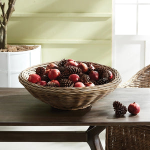 The NAPA HOME AND GARDEN - ELOISE DISPLAY BASKET is a shallow, round wicker basket with a natural woven design and wide open top. Crafted from light brown, tightly woven materials, it offers a rustic simplicity ideal for curated displays or as an elegant centerpiece.