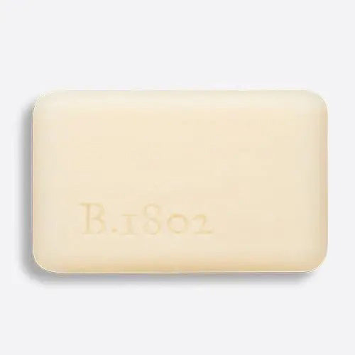 A white bar of PURE GOAT MILK 3.5 SOAP by BEEKMAN - STA ELEMENTS in rectangular packaging with yellow accents is centered on a plain white background.