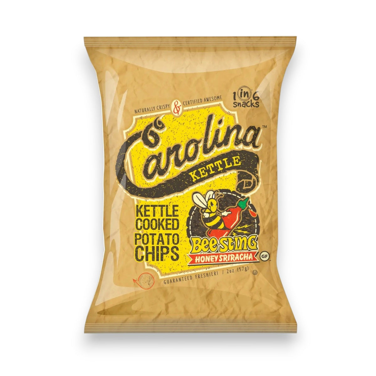 A 5oz bag of CAROLINA KETTLE - HONEY SRIRACHA CHIPS from 1 IN 6 SNACKS comes in tan packaging with a cartoon bee holding a honey dipper and bold yellow-black text, representing the sweet and spicy chips inside.