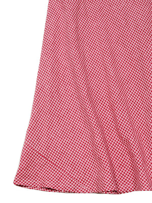 A Marnie skirt in fruit punch gingham from THE LITTLE PROJECT is displayed flat on a white background. Crafted in Los Angeles, this A-line design features a fitted waist that flares elegantly towards the hem.