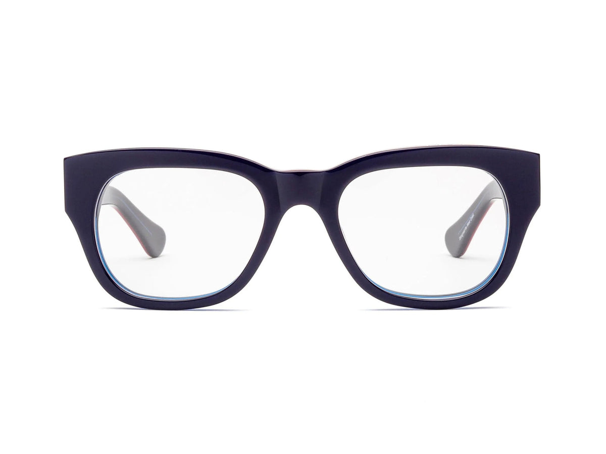 The CADDIS - MIKLOS PROGRESSIVE READERS by CADDIS, black thick-rimmed eyeglasses with durable scratch-resistant lenses, shown from the front against a white background.
