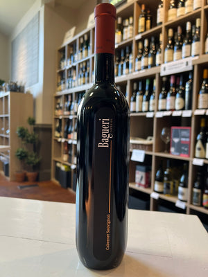 A tall, dark bottle of KLET BRDA 'BAGUERI' CABERNET SAUVIGNON 2019 by WINE: OCEAN SOUTH IMPORTS, featuring a copper foil top and vertical black label, photographed against a white background.