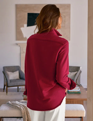 The FRANK & EILEEN EILEEN Sweatshirt Button Up in Garnet is a maroon, relaxed-fit, long-sleeve shirt with left chest pocket and rolled cuffs. Flattering button placement enhances its casual style. Displayed against a white background.