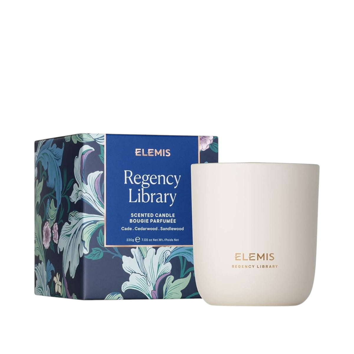 The ELEMIS - REGENCY LIBRARY CANDLE by ELEMIS - STEINER is housed in an elegant white container with gold lettering. Its floral-patterned box complements the rich aroma of leather, cedarwood, and sandalwood that it emits.
