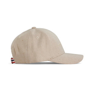 The AMUNDSEN SPORTS - WOOL CAP is a dark brown wool cap with a curved brim, subtle front embroidery, Norwegian design touches, and an adjustable strap, shown on a white background.