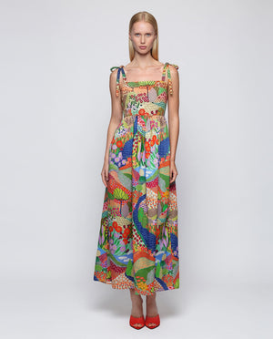 The MIRTO 1956 Multicolor Print Maxi Dress is a sleeveless cotton dress with tie straps, a square neckline, and a vibrant patchwork of floral and geometric designs in red, green, blue, yellow, and purple.
