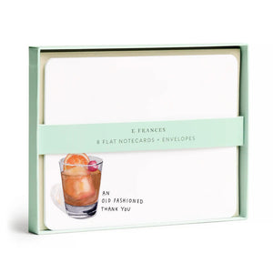 E. FRANCES PAPER's "An Old Fashioned Thank You" flat notes feature watercolor notecards of an Old Fashioned cocktail with the message and include envelopes. Made in the USA, they come in a light green box with a label band.