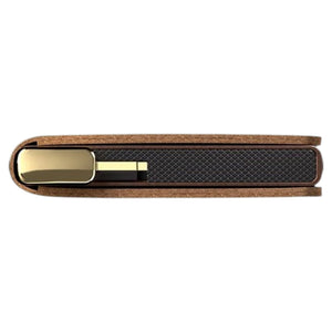 A slim, rectangular SECRID - PREMIUM SLIMWALLET+ EMBOSS LINES IN COGNAC cardholder, displayed vertically with a brown embossed finish and metallic bottom edge. This RFID-protected wallet from SECRID effortlessly combines sophisticated style and security for your daily essentials.