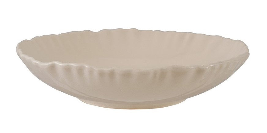 Two views of the CREATIVE COOP HAND-PAINTED ORGANIC SHAPED STONEWARE LOW BOWL WITH BOTANICALS: one features botanical artwork of trees inside, while the other shows its scalloped, organic-shaped edge.