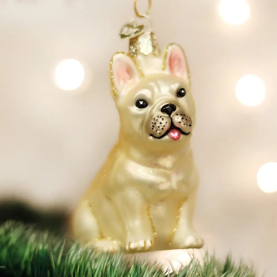 FRENCH BULLDOG ORNAMENT shaped like a sitting cream-colored dog with a gold hanging cap.