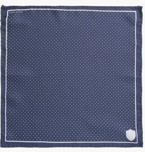 The CLIFTON WILSON - NAVY & WHITE POLKA DOT SILK POCKET SQUARE features Italian silk in navy blue, a white dot grid pattern, a crisp white border, and a "CGW" crest in one corner.