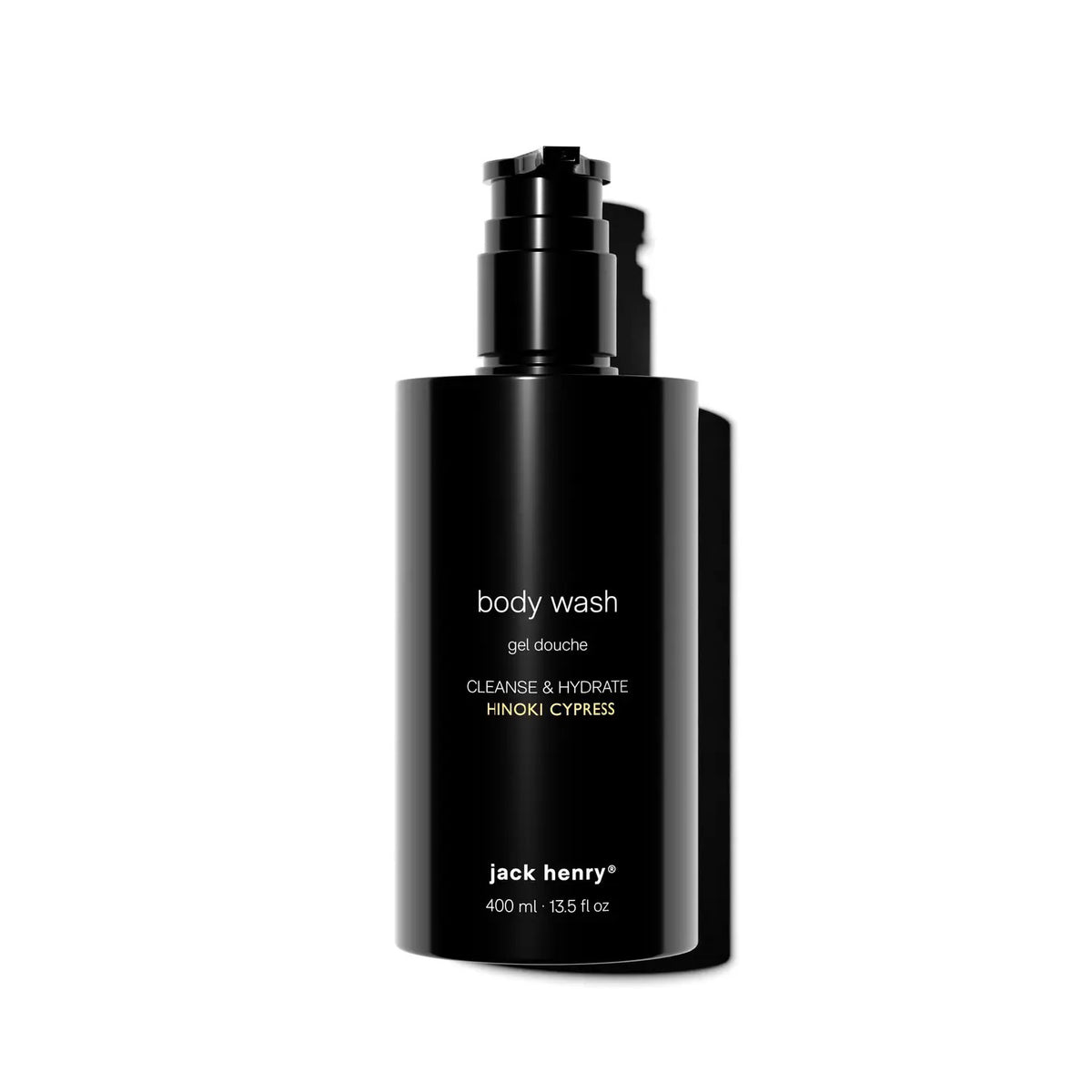 A sleek black 400ml bottle of JACK HENRY - BODY WASH with a pump dispenser, featuring “cleanse &amp; hydrate hinoki cypress” on the label and highlighting its natural botanical scent.