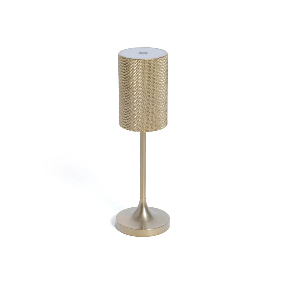 The FACET RECHARGEABLE LAMP by ZODAX is a modern gold table lamp with a textured cylindrical shade, slender stem, and round base. It offers adjustable light intensity and is displayed against a plain white background.