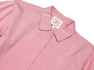 The ESME SHIRT IN STRAWBERRY by THE LITTLE PROJECT is a pink button-up, crafted from Japanese cotton with a small collar and puffed long sleeves. Its straight-cut design includes an interior label with initials.