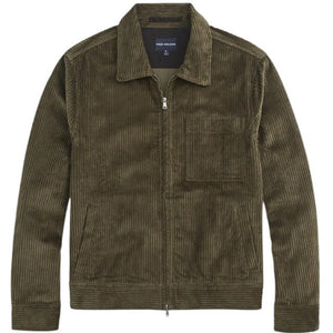 The MACK WELDON - CORDUROY ZIP JACKET is a modern-fit, dark blue corduroy jacket with a front zipper, long sleeves, collar, and chest pocket—shown against a white background.