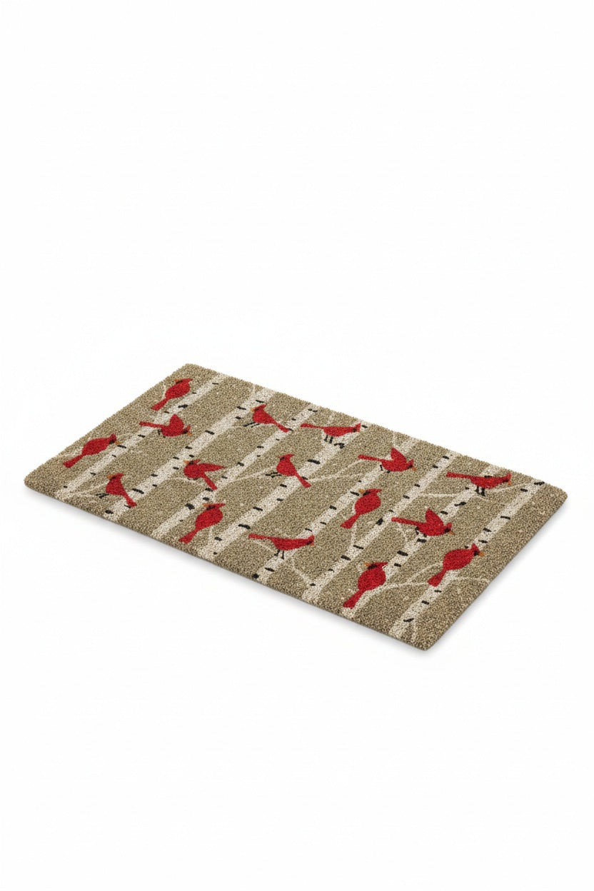 Rectangular CARDINALS IN BIRCH DOORMAT by ABBOTT, featuring a pattern of red cardinals perched on birch tree branches.