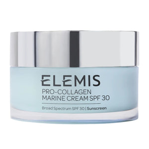An open jar of ELEMIS - PRO-COLLAGEN MARINE CREAM SPF30 100ML by ELEMIS - STEINER sits on a bathroom counter, with text highlighting its anti-aging and hydrating benefits, and clinical trial results displayed at the bottom.