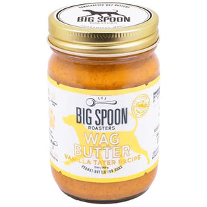 BIG SPOON ROASTERS WAG BUTTER VANILLA TATER is a handmade nut and peanut butter for dogs, with a gold lid and white label with yellow accents and a dog silhouette—an irresistible treat from BIG SPOON ROASTERS.