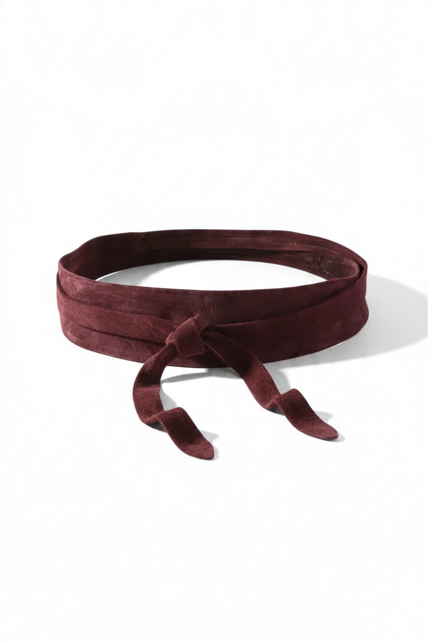 ADA - SUEDE LEATHER WRAP BELT IN BERRY, a deep red suede wrap belt with a tie front designed as a versatile one size accessory.