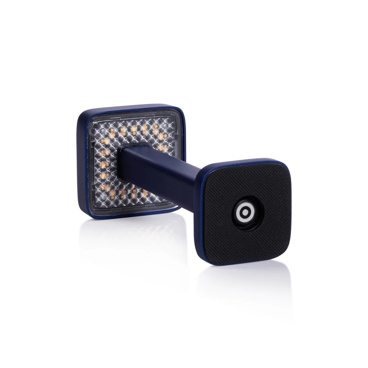 The ZODAX MONZA RECHARGEABLE TABLE LIGHT is a black, rectangular, pedestal-shaped device with a square touchpad on top, offering USB rechargeable capability and adjustable light intensity, shown upright on a white background.