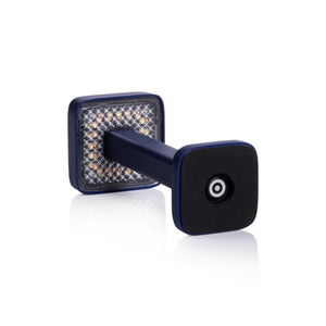 The ZODAX MONZA RECHARGEABLE TABLE LIGHT is a black, rectangular, pedestal-shaped device with a square touchpad on top, offering USB rechargeable capability and adjustable light intensity, shown upright on a white background.