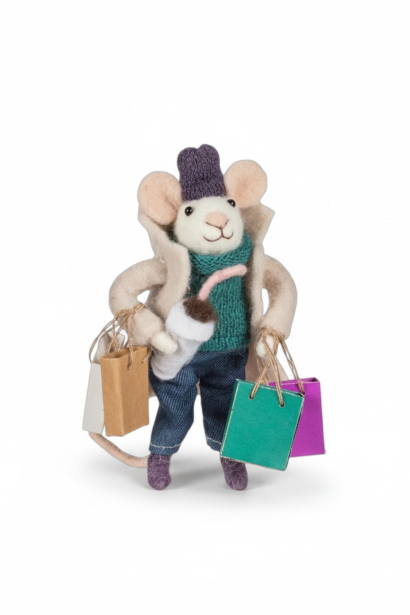 SHOPPING MOUSE ORNAMENT made of wool felt, wearing a coat and hat while carrying shopping bags and a drink cup.