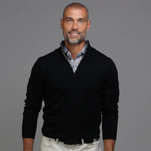 The COLLARS AND CO - CASHMERE TOUCH AUSTRALIAN MERINO 1/4 ZIP SWEATER by COLLARS AND CO is a black long-sleeve quarter zip sweater featuring a stand-up collar, crafted from Cashmere Touch Australian Merino wool and shown on a plain white background.