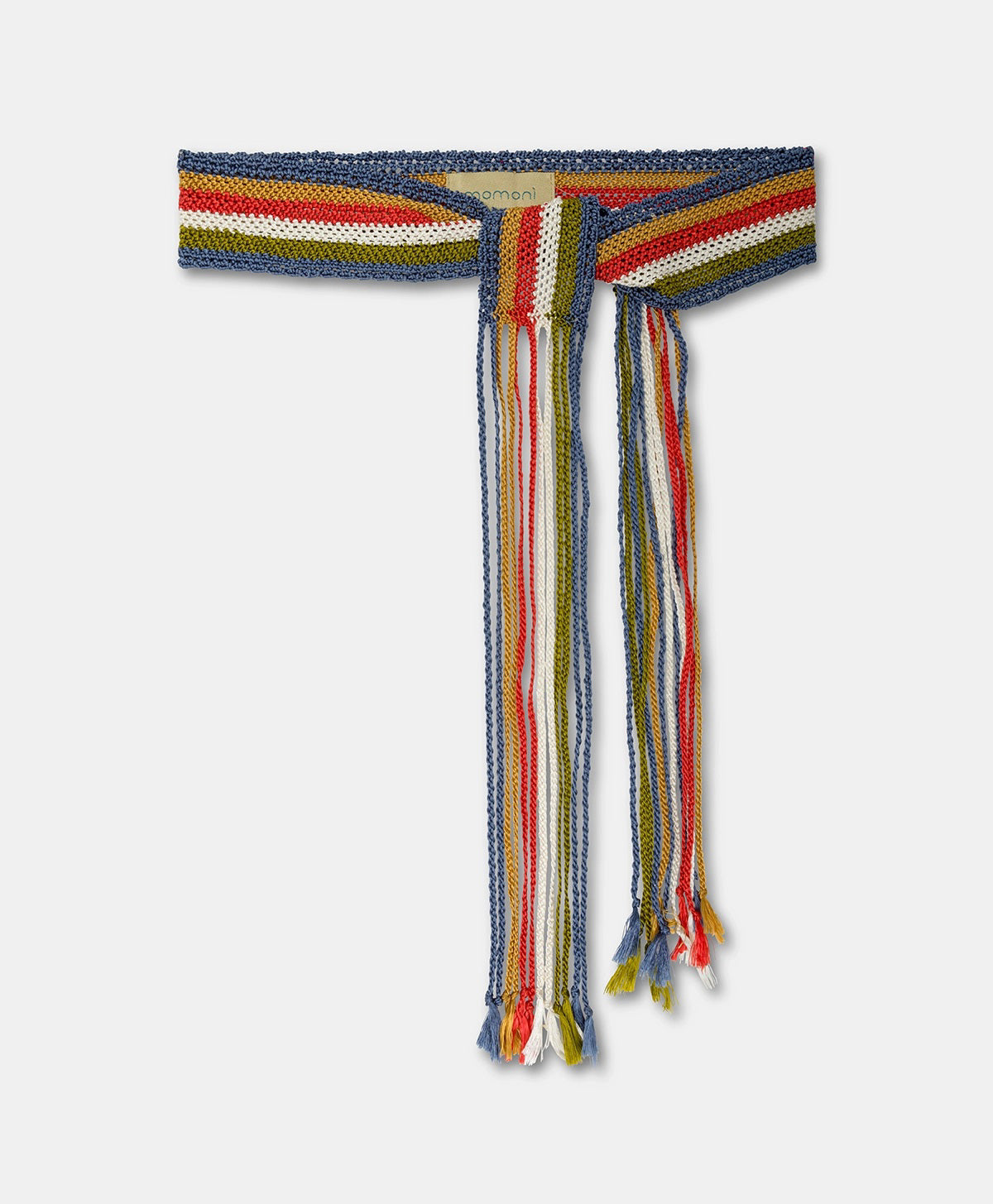 The MOMONI - JOSIE SASH BELT by MOMONI is a knitted accessory with braided maxi fringes in beige, cream, and brown shades. It features varying length fringes and a small label at the top.