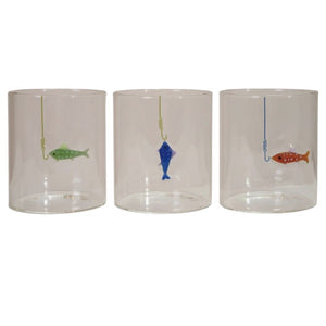 Set of three CREATIVE COOP HAND-BLOWN DRINKING GLASS WITH FISH ON HOOK, each with a unique green, blue, or red fish design—perfect for adding a playful accent to any coastal décor.