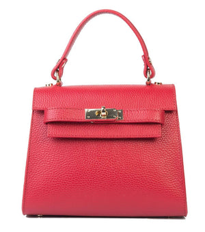 The LE BORSETTE LEATHER SATCHEL BAG is a small, structured satchel-shaped handbag in light pink, featuring a gold clasp at the front. It boasts a single top handle, an adjustable shoulder strap, and two gold-tone hardware pieces on either side of the handle. The textured leather adds to its luxurious and elegant appearance against the plain white background.