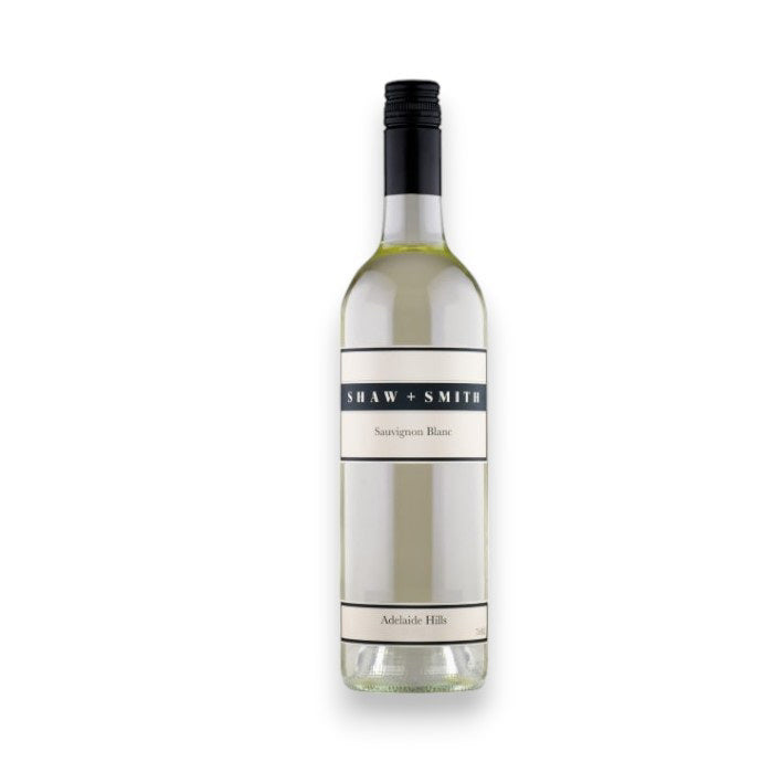 A clear glass bottle of SHAW AND SMITH SAUVIGNON BLANC 2024 by WINE: WINEBOW features a simple white label and black screw cap. The wine has a fresh nose and is photographed on a white background. Ships to North Carolina.