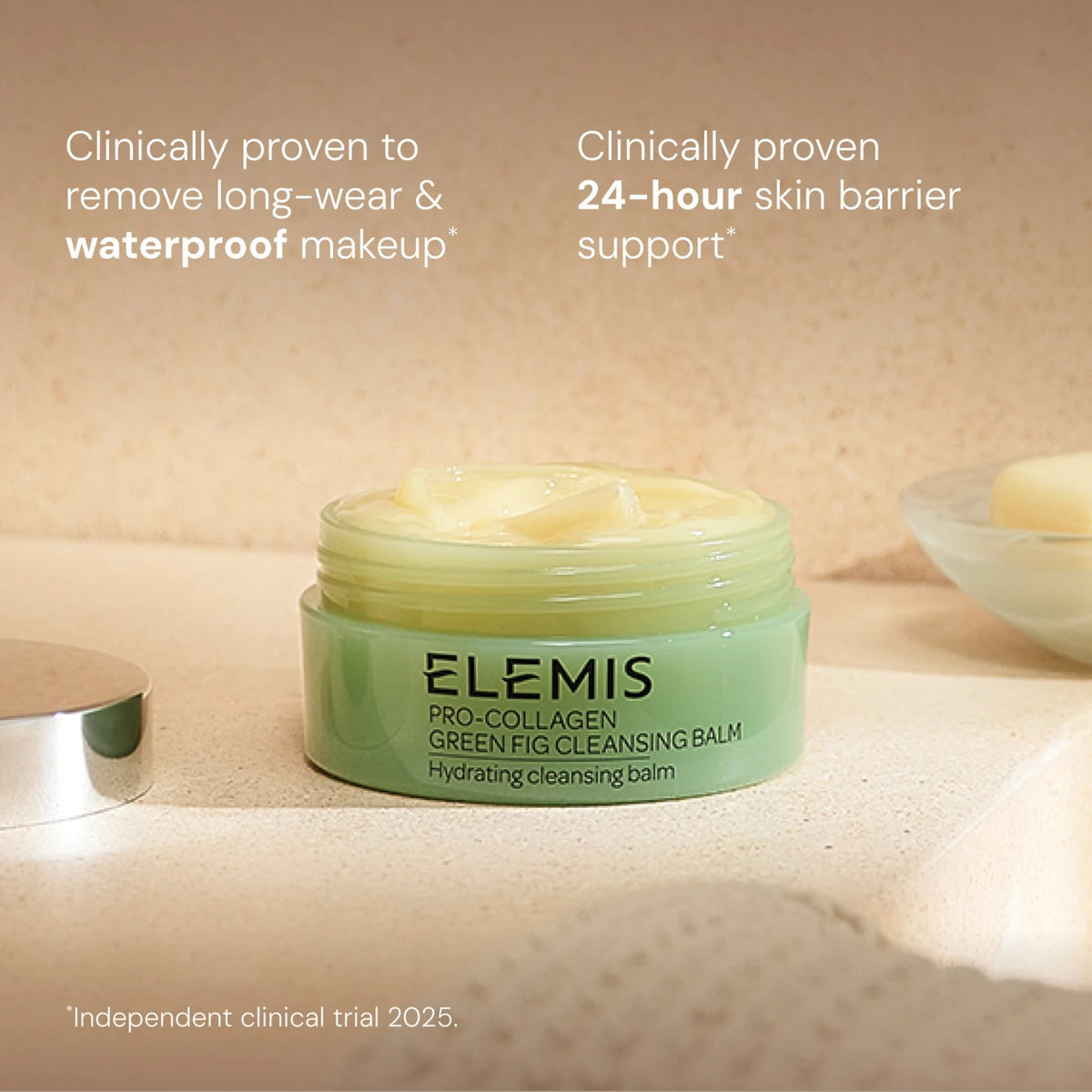 Three textured swatches—yellow, pearly white, and translucent—overlap on a pale background. Text reads: “3-in-1 transformative texture. Rich balm, nourishing oil, hydrating milk.” Experience the multi-tasking power of ELEMIS - PRO-COLLAGEN GREEN FIG CLEANSING BALM by ELEMIS - STEINER—a luxurious facial cleansing balm that also acts as an effective makeup remover.