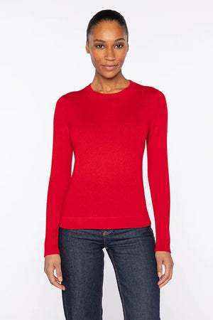 Close-up of the KINROSS CASHMERE - CASHMERE CREWNECK SWEATER, showcasing its soft blue knit, textured vertical ribbing, and premium cashmere yarn—a timeless classic from KINROSS.