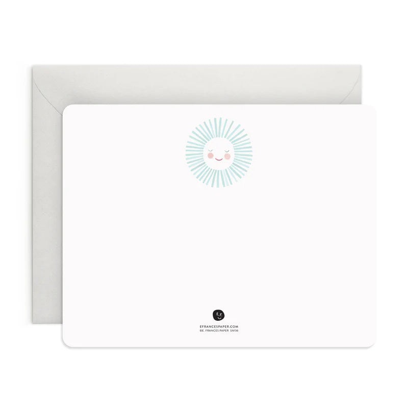 The E. FRANCES - FLAT NOTES BLUE SUNSHINE by E. FRANCES PAPER features a blank notecard with rounded corners and a cheerful sun at the top, paired with a plain white envelope—perfect illustrated stationery for hand-written notes on any occasion.