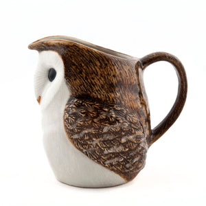 The QUAIL CERAMICS - BARN OWL JUG by QUAIL DESIGNS is a handpainted stoneware mug with brown and white detail, large black eyes, feather texture, a back handle, and is dishwasher safe. Shown against a white background.