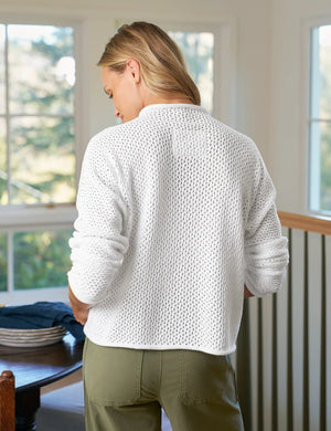 The FRANK & EILEEN Monterey Pointelle Rolled Funnel Neck Cotton Sweater in White features a relaxed fit, long sleeves, and lightweight 100% cotton Italian Pointelle fabric, shown on a plain white background.