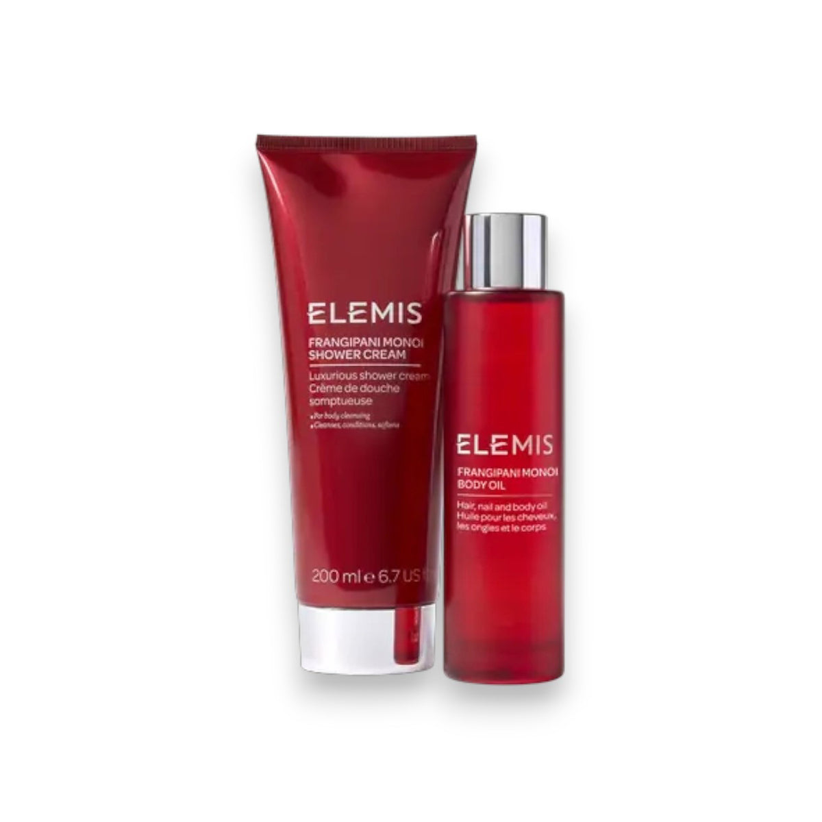 The ELEMIS - BODI WONDERS DUO SET by ELEMIS - STEINER is displayed on snow with a red shower cream, red body oil, and a blue cylindrical box, all set against a dark blue snowy background.