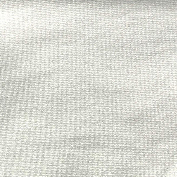 Close-up of the MEIMEIJ - PULL ON LEGGING PANT by MEIMEIJ, featuring a dark blue, tightly woven fabric with a slightly textured surface and uniform finish—ideal for ankle-length stretch leggings.